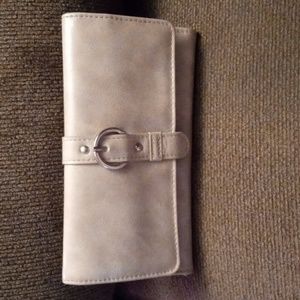 Tan wallet with 14 pockets including 2 change pockets